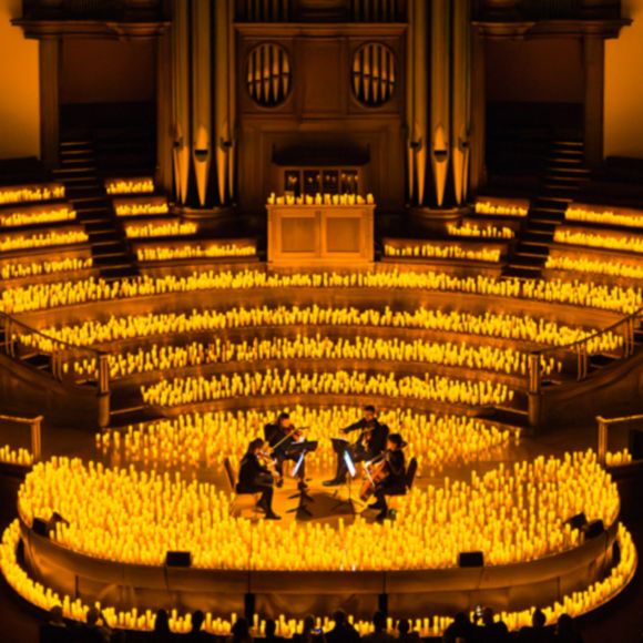 A candlelit concert in Central Hall Westminster, linking to www.bahighlife.com.