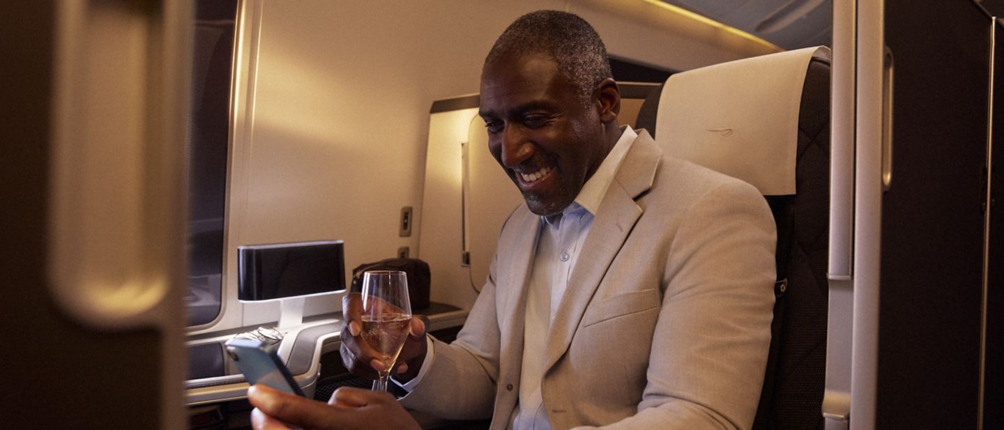 https://ba.scene7.com/is/image/ba/customer-wine-mobile-phone-first-1:21-9?wid=1440&hei=617