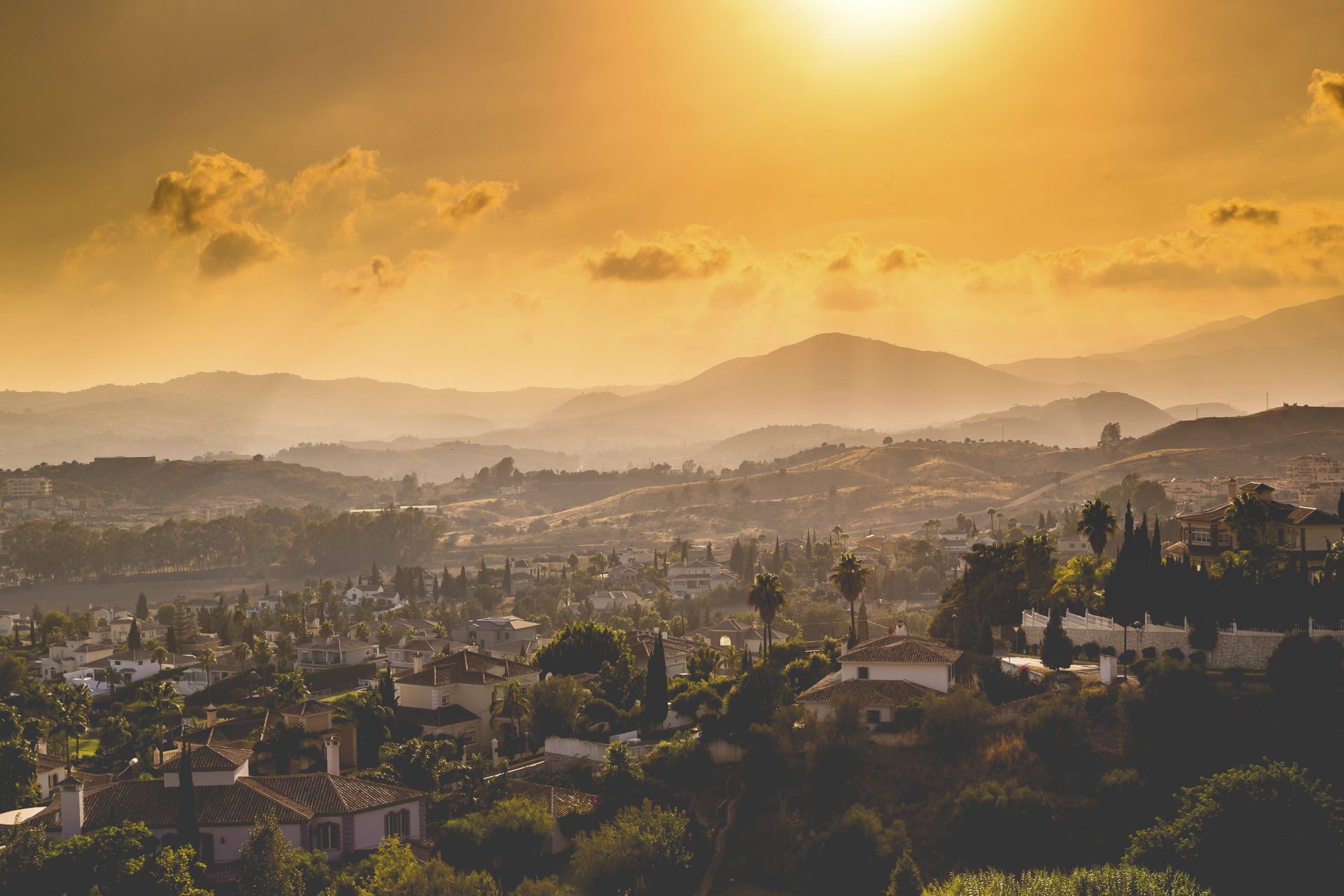 Panoramic view of townscape and rural hills in Malaga.