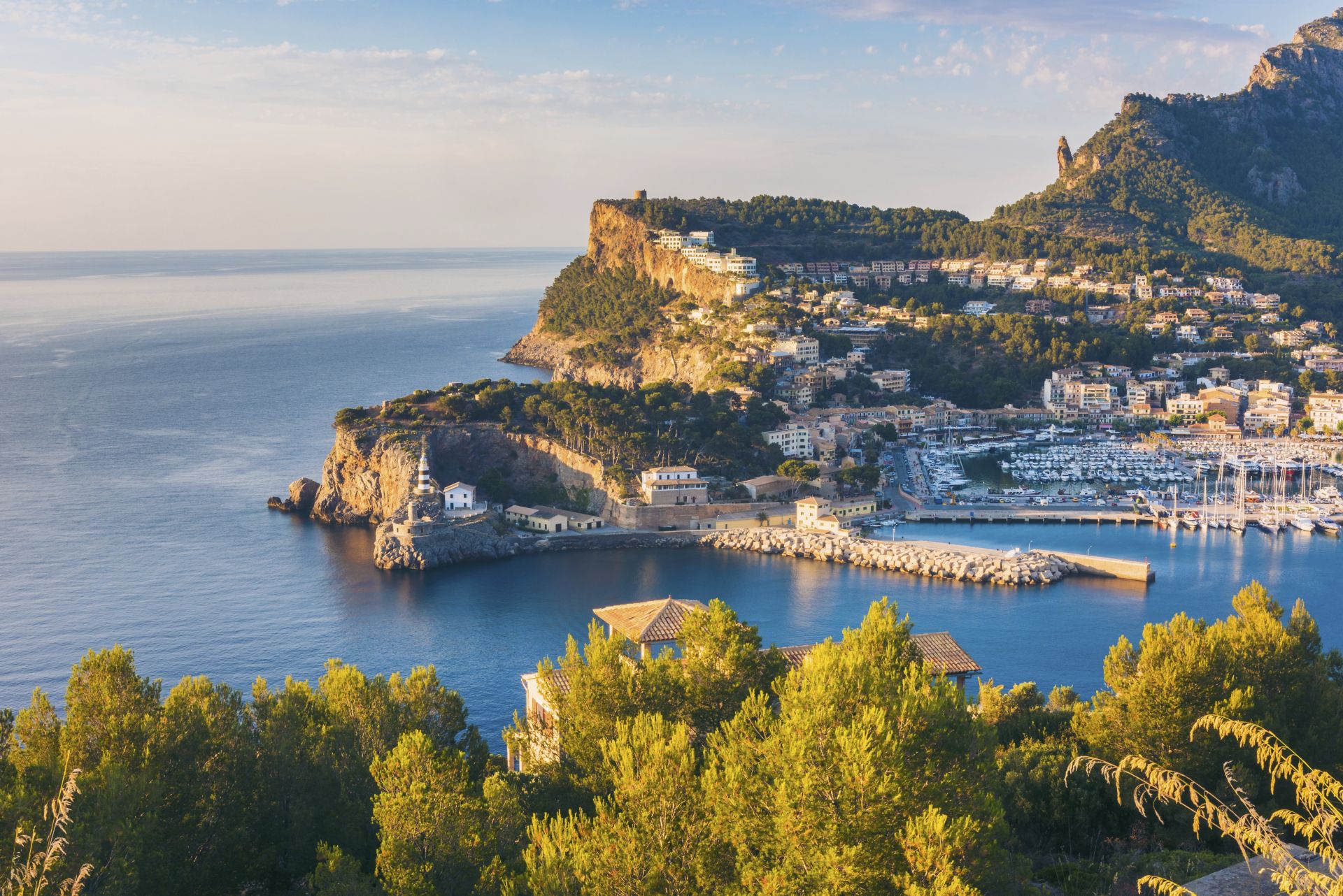 View of Port de Soller coastline and marina in Majorca.