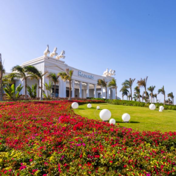 The grand exterior of the Rixos Radamis Sharm El Sheikh Resort, linking to www.bahighlife.com.