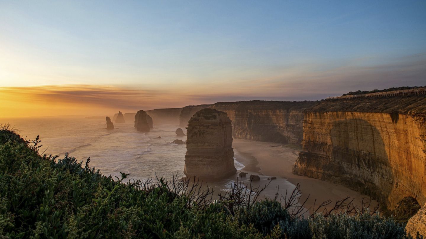 Twelve Apostles on the Great Ocean Road at sunset in Melbourne, Australia.